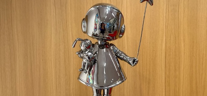 Astro girl with doodoo - polished stainless steel - 20" inch